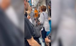 Marmaray'da yanında oturan kadının başörtüsünü açmaya çalıştı, tepki çekti