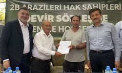 AK Parti'li Dağ, İzmir'de tapu teslim törenine katıldı