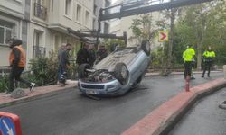 Beyoğlu'nda takla atan otomobilin altında kalmaktan son anda kurtuldu