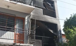 Yangında mahsur kalan 15 yaşındaki çocuğu mahalleli kurtardı