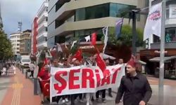 Trabzon'da bir grup genç 'şeriat' yazılı pankartla yürüyüş düzenledi