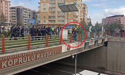 Üst geçitten atlamak isteyen kişiyi polis kurtardı