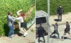 Tartıştığı kadını sokak ortasında yumrukladı!