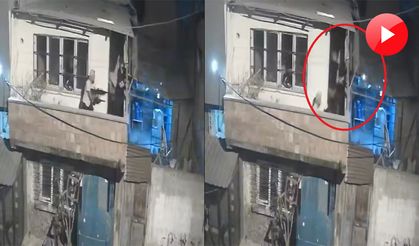 Husumetli komşular balkonlardan çatıştı; olay kamerada