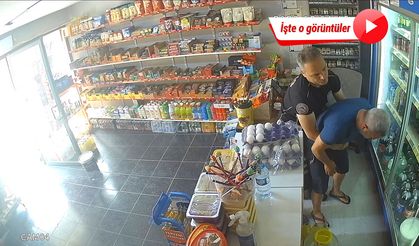 Nefes borusuna şeker kaçan bakkalı, polis Heimlich manevrasıyla kurtardı; işte o anlar!