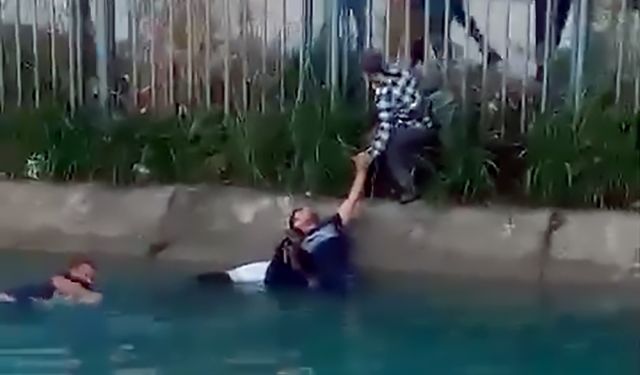 Sulama kanalına düşen kadını çevredekiler kurtardı