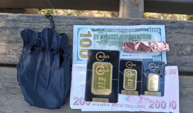 Plajda bulduğu altın kesesini polise teslim etti