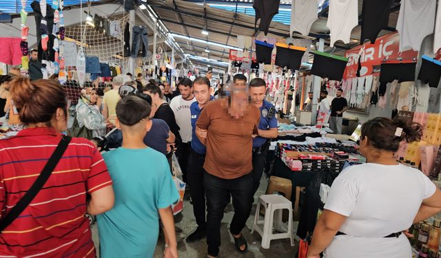 Pazar yerinde kadınların görüntülerini çeken şüpheliye gözaltı