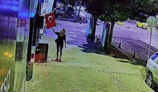 Mağazanın önünde asılı olan Türk bayrağını yakan şüpheli gözaltına alındı!