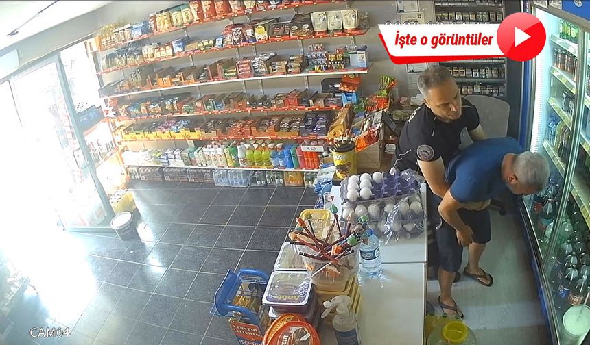 Nefes borusuna şeker kaçan bakkalı, polis Heimlich manevrasıyla kurtardı; işte o anlar!